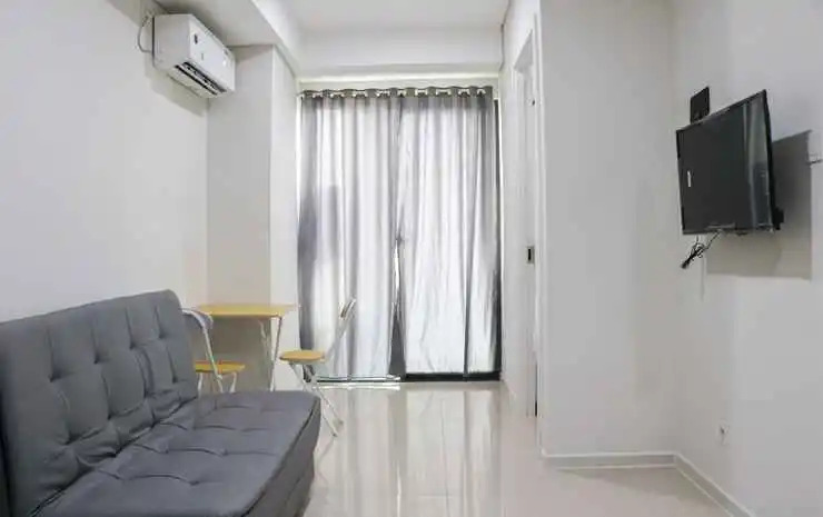 Comfort and Clean 2BR at Daan Mogot City Apartment By Travelio