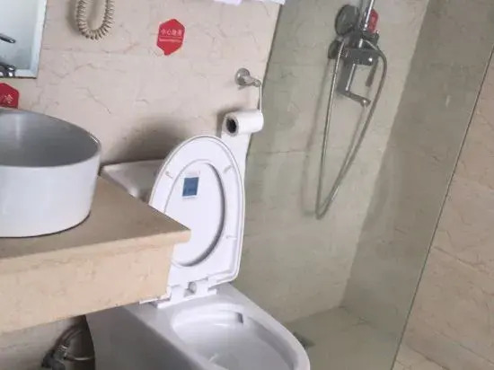 99 Xinyi Hotel (Shanghai Jiuxin Highway Shop)