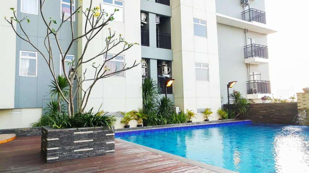 2 Bedrooms at Gading Greenhill Apartment by Travelio