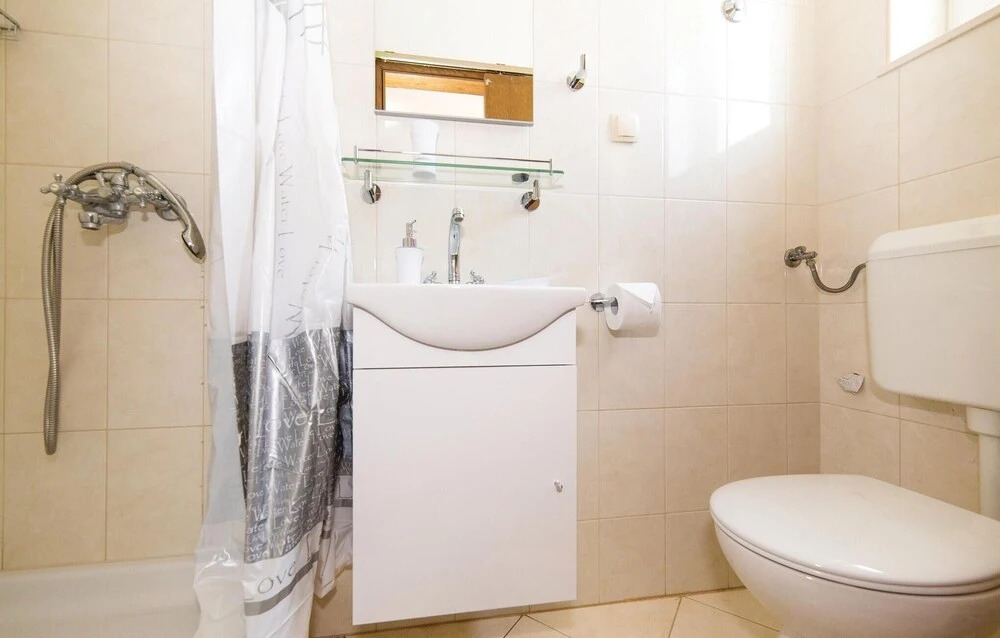 Three-Bedroom Holiday Home In Kastel Stafilic