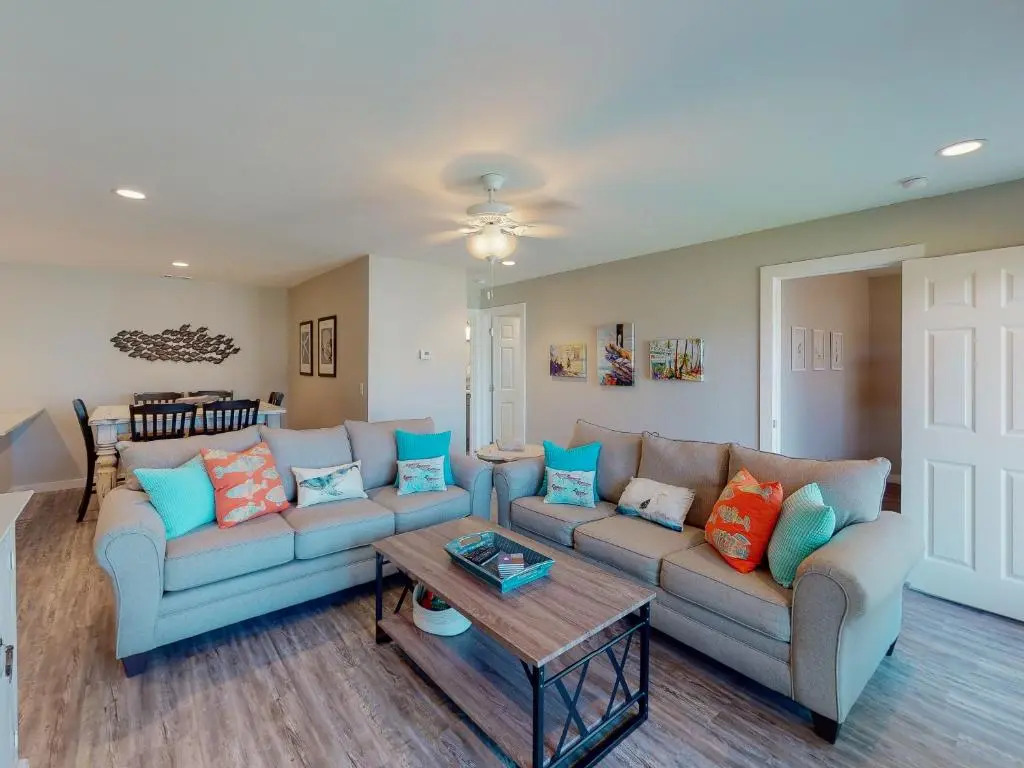 AH-E117 Remodeled First Floor Condo, Across From The Shared Pool & Hot Tub, Near Marina & Ferry