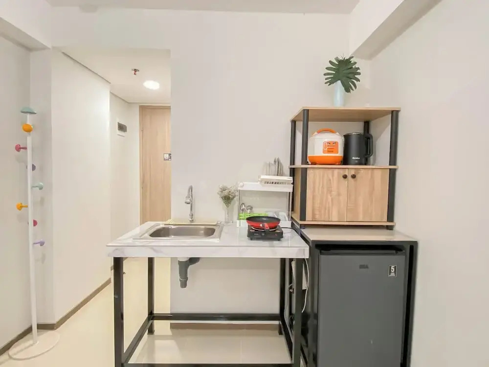 Modern Minimalist With Wooden Touch Studio At Apartment Meikarta