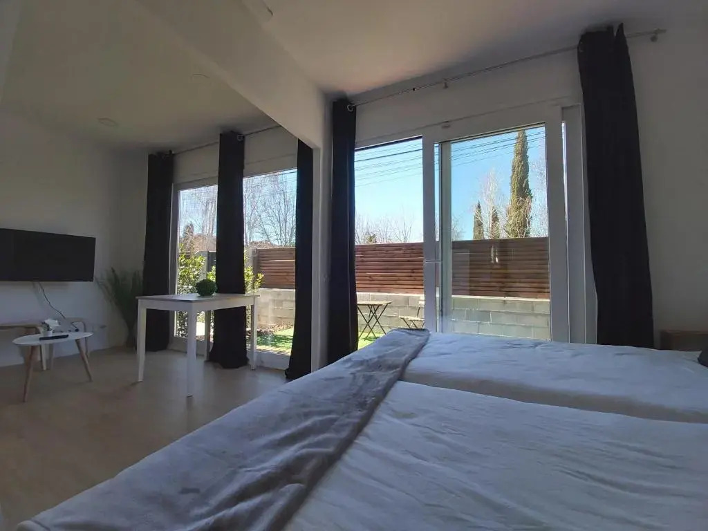 Acero y Piedra Apartamentos con jardín privado