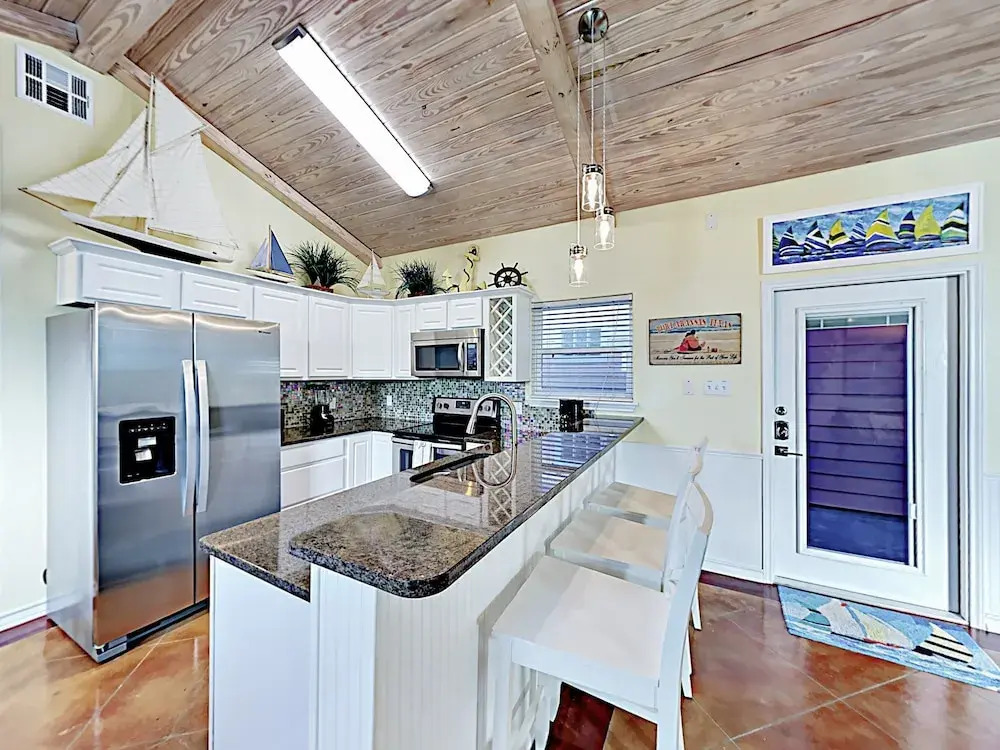 Sail Away Coastal Port Aransas Condo by RedAwning