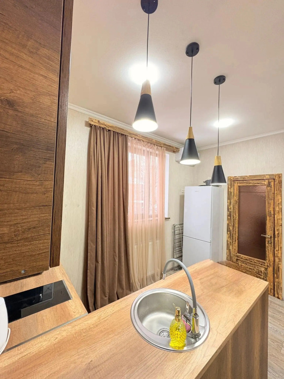 Апартаменты Two-bedroom family apartment for four guests with one large bed and two sofa beds