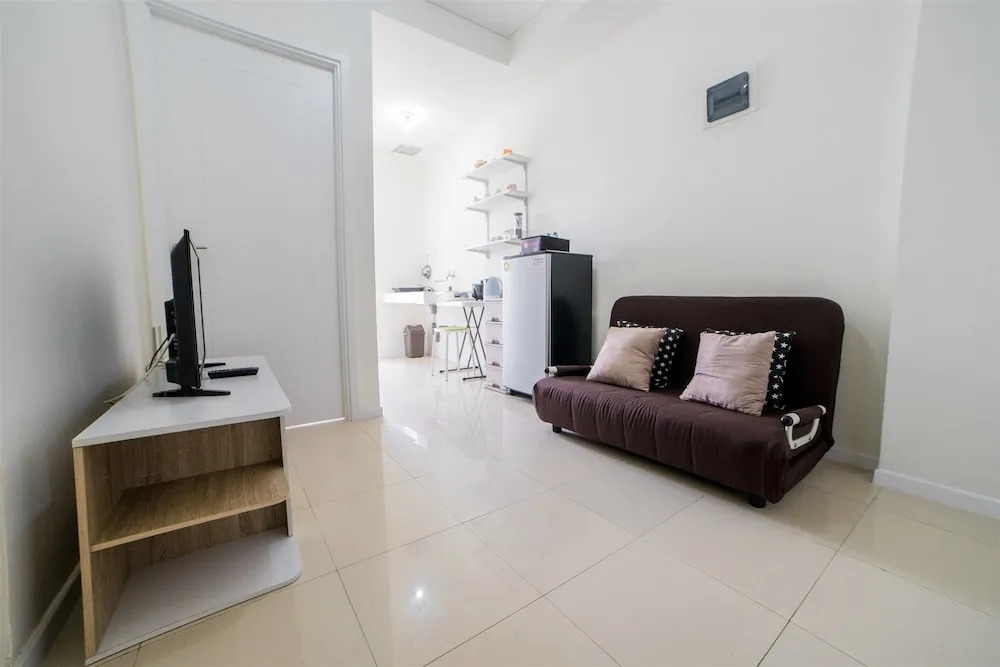 Minimalist Apartment with Sofa Bed at Parahyangan Residence