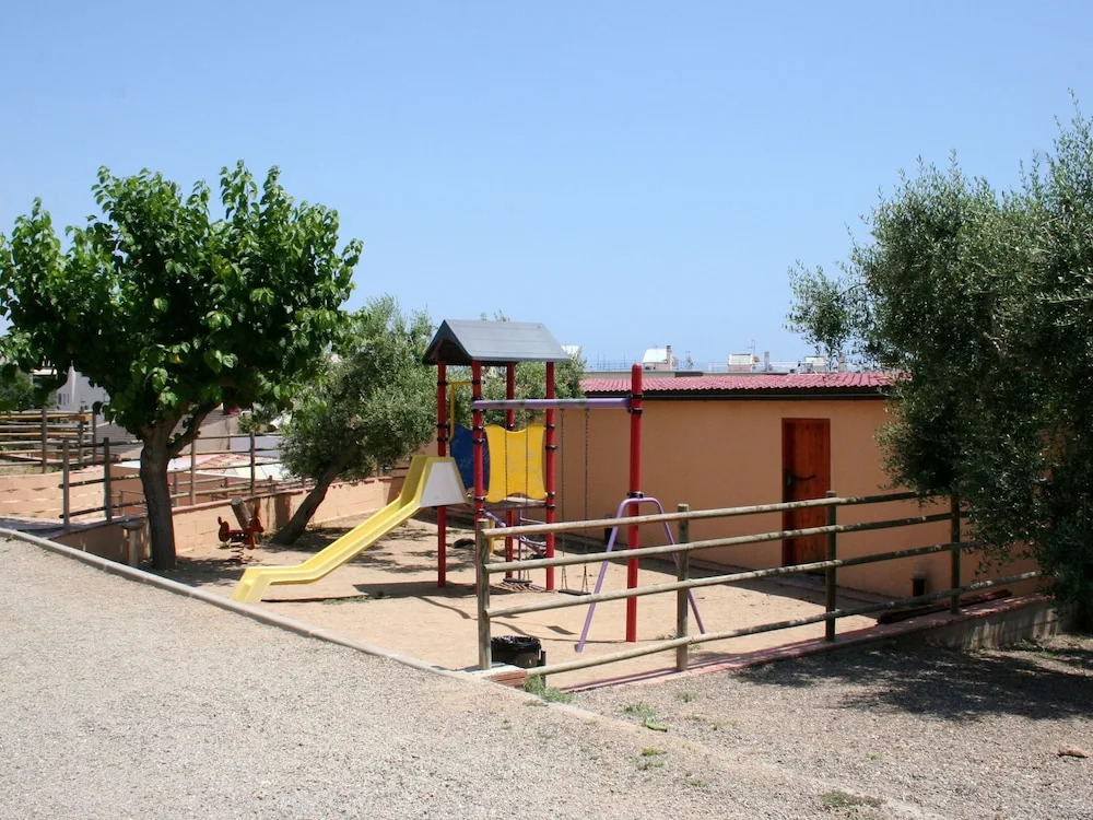 Attractive Bungalow With a Covered Terrace, Near the Beach