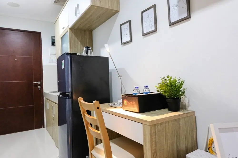 Cozy Studio Apartment with Smart TV at Springwood Residence