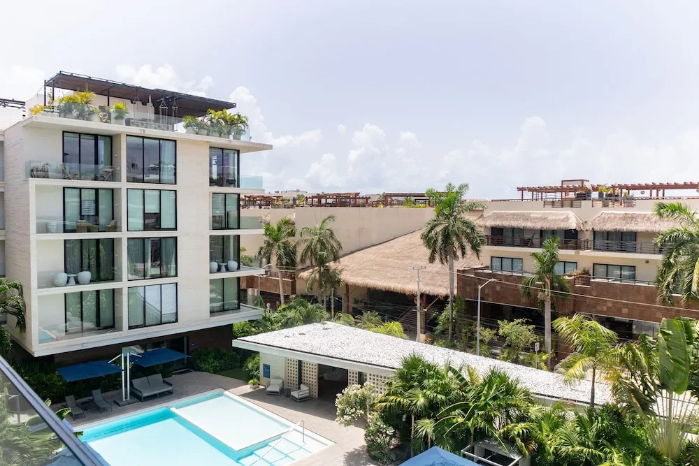 Contemporary Design Oceana 422 Playa del Carmen Condo by RedAwning