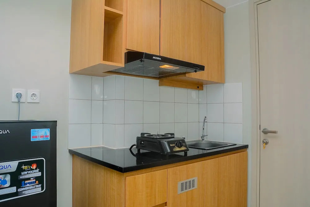 New Furnsihed Studio Room Apartment at Springlake Bekasi By Travelio
