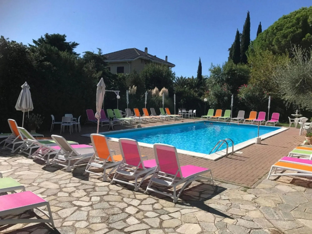 Snug holiday home in Loano with shared pool