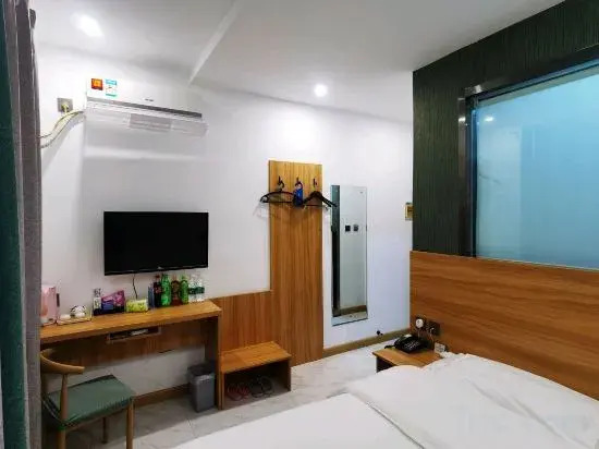 Daqing Boger Hotel (Xinmate Store)