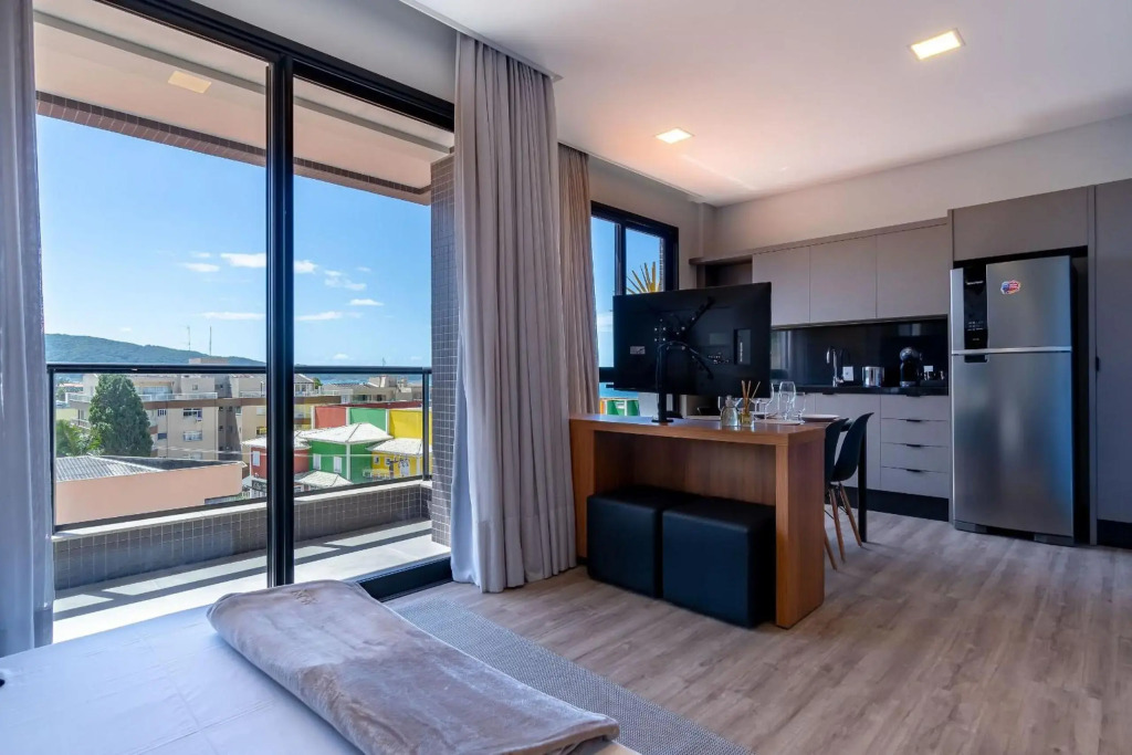 AION suítes 305 - Compacto e luxuoso loft duplex - Rooftop com piscina e academia - À poucos passos da praia