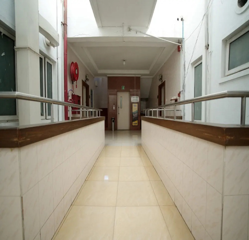 Blossoms Hotel & Service Apartments
