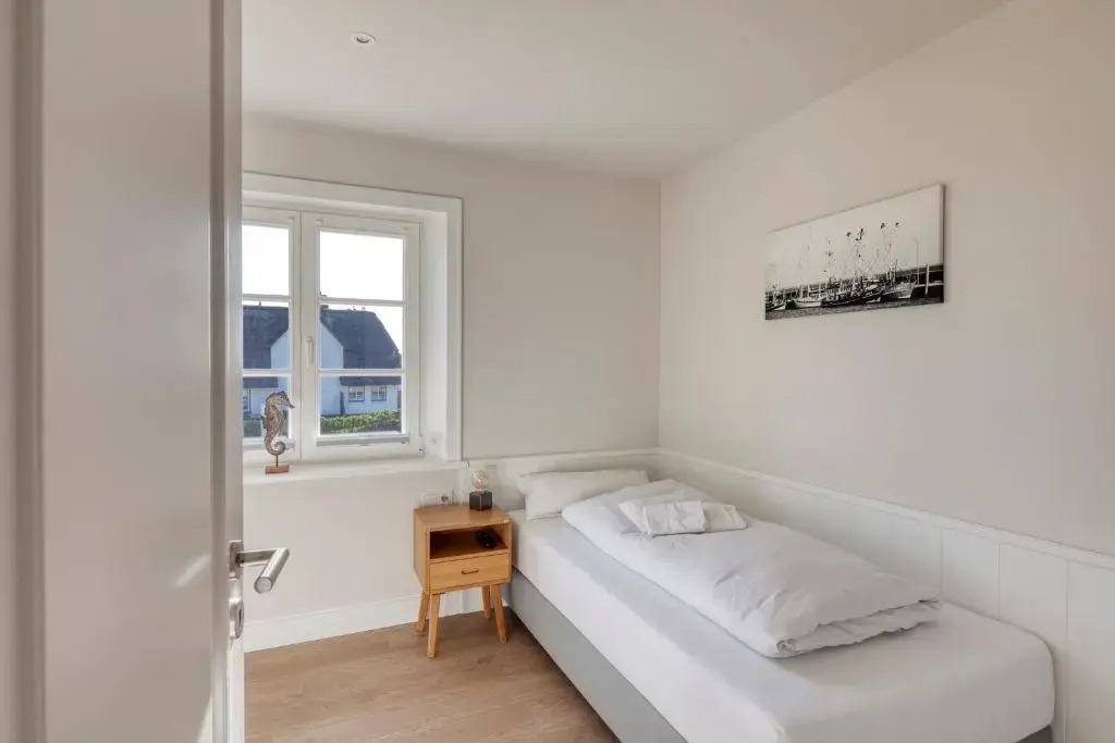 Rantum Dorf - Ferienappartments im Reetdachhaus 3 & 4