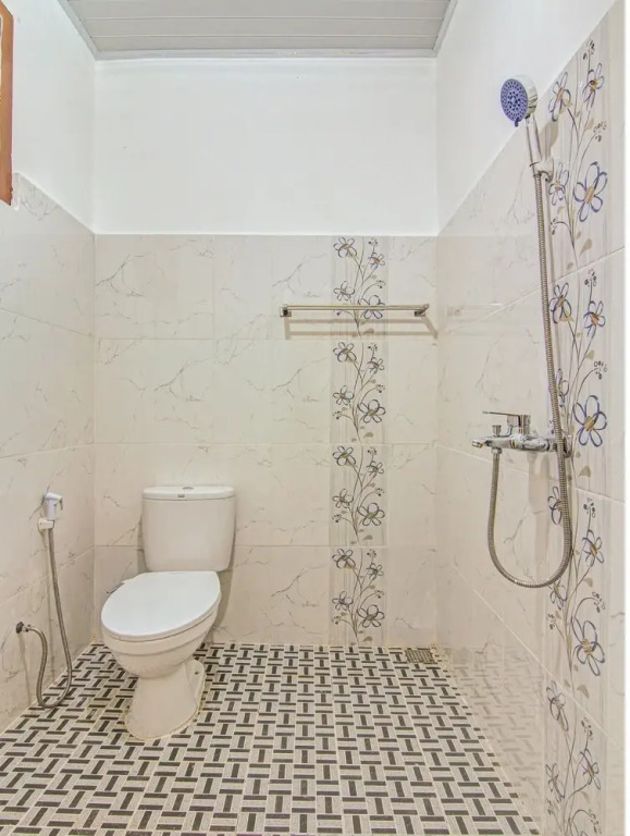 Capital O 90643 Suri Guest House Syariah