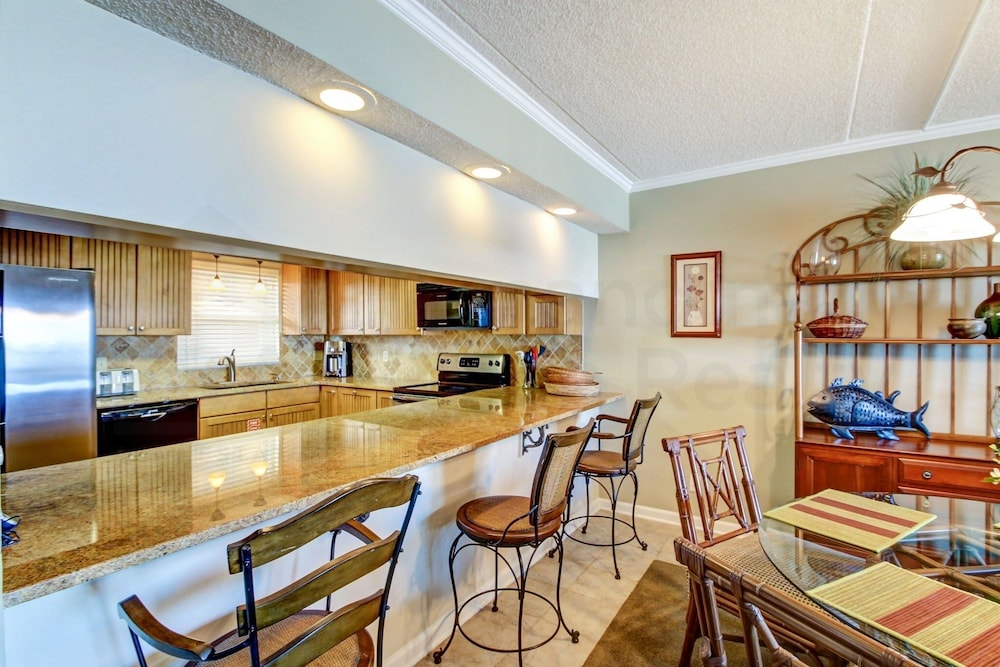 Oceanfront Condo with Spacious Patio and Private Walkway to the Beach