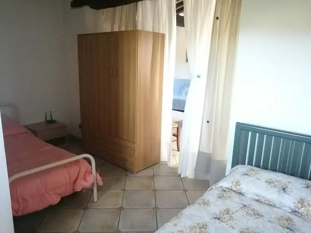 Portion of a Farmhouse With 30 Beds - 4 Apartments and 2 Rooms