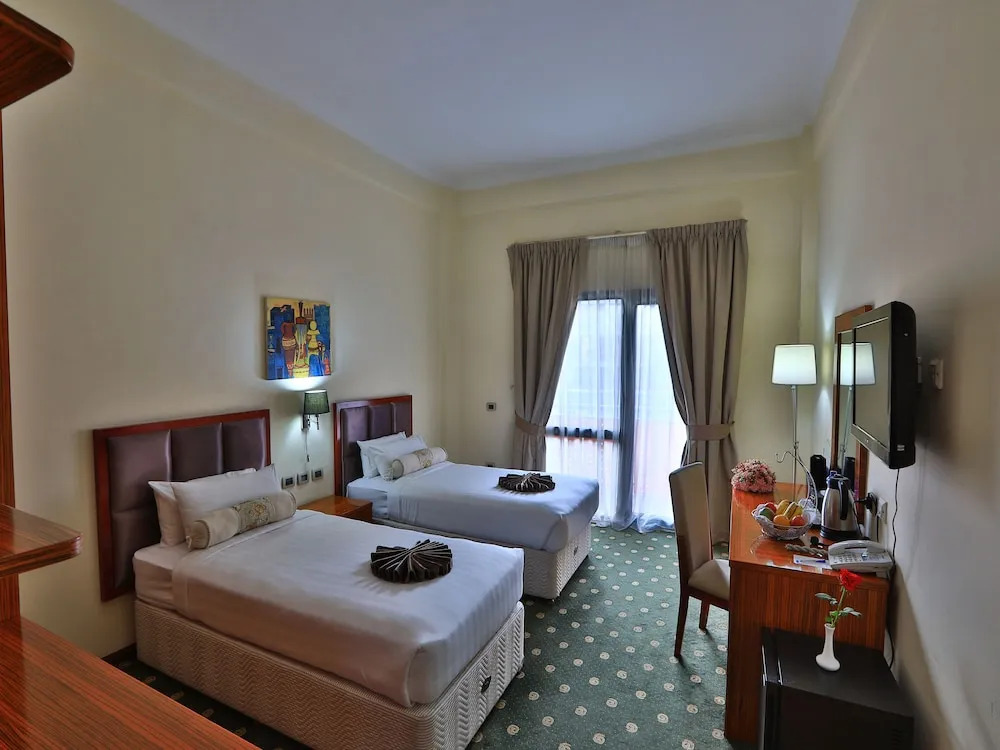 Kenenisa.. Oasis International Hotel