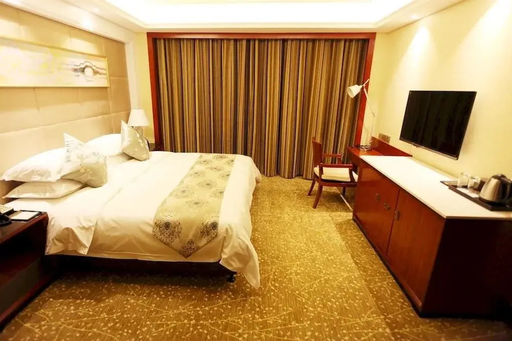 Planet International Hotel (Jingmen Duodao Wanda Branch)