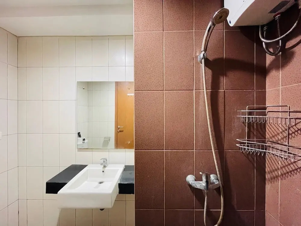 Cozy and Serene Studio Dago Suites Apartment By Travelio