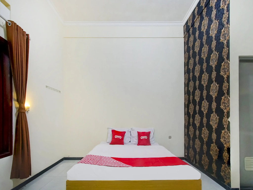 Capital O 90151 Guest House 180