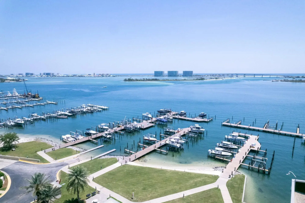 Condo on bay with boat launch and multiple pools