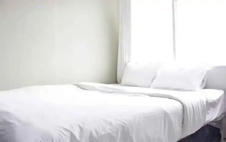 Homey and Relaxing 3BR Apartment at The Jarrdin Cihampelas By Travelio