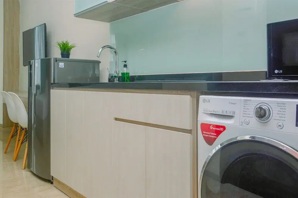 Fully Furnished and Comfortable Design Studio Menteng Park Apartment By Travelio