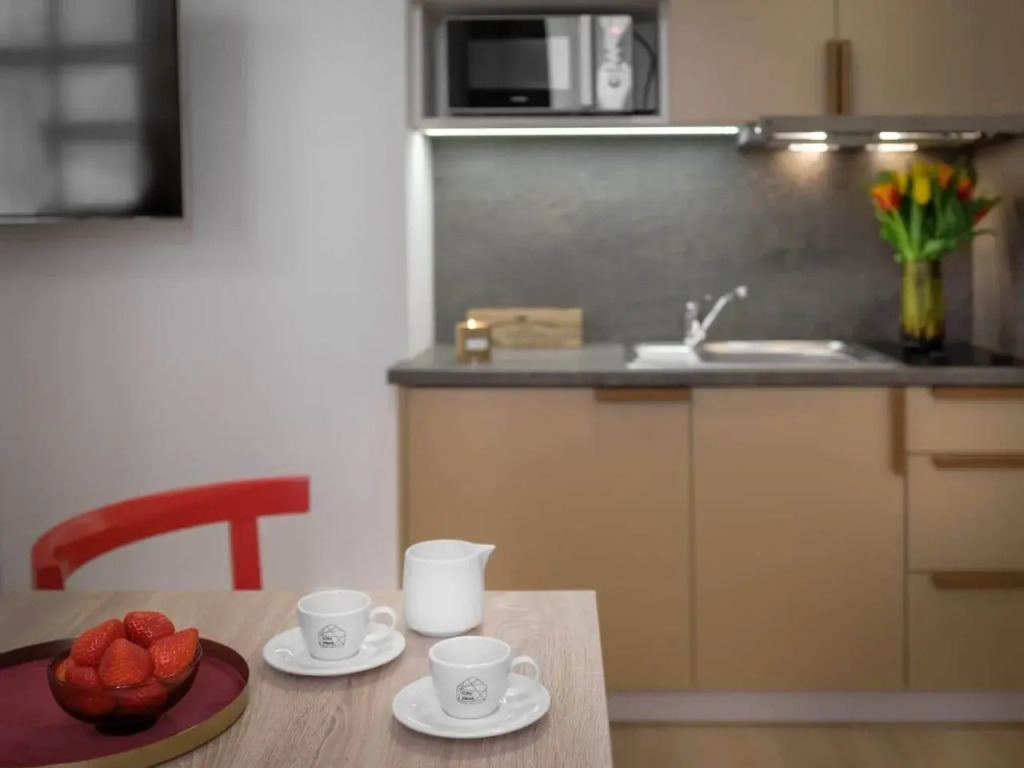 City Nest Apartments by Adrez