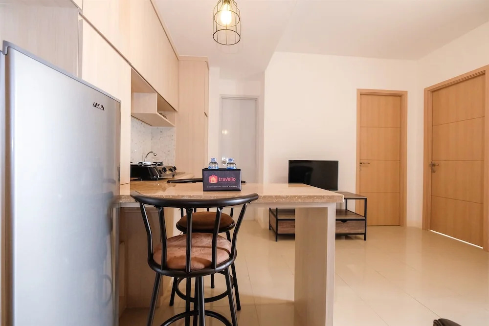 Spacious 2 Bedroom at Bassura City Apartment By Travelio