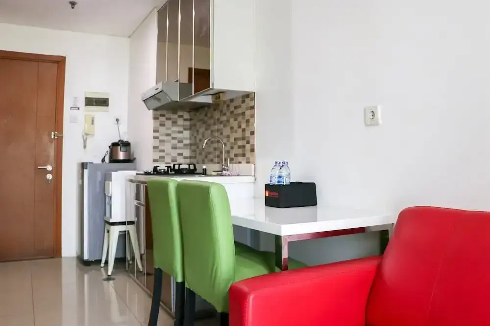 Great Location and Comfy 1BR Apartment at Woodland Park Residence By Travelio