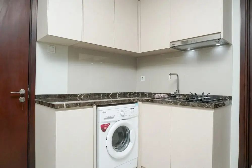 Minimalist 3BR Apartment at Puri Mansion