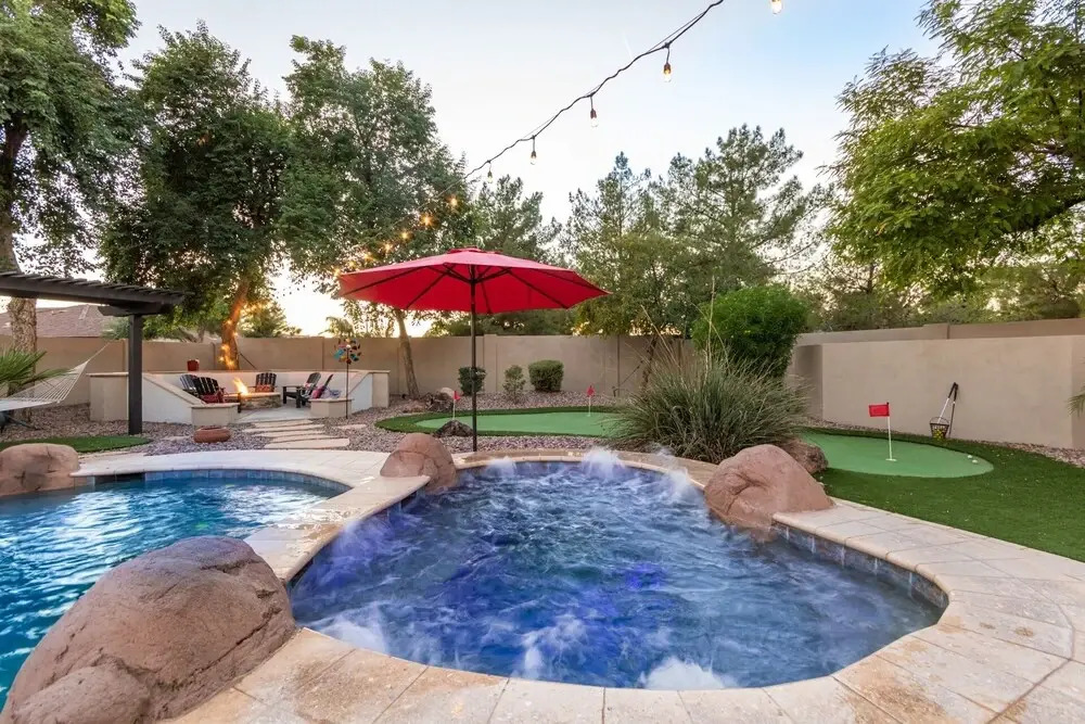 Immense Chandler 5 Bedroom Home Sleeps 10 Comfortably! Game Room Putting Green, Heated Pool and Spa. by RedAwning