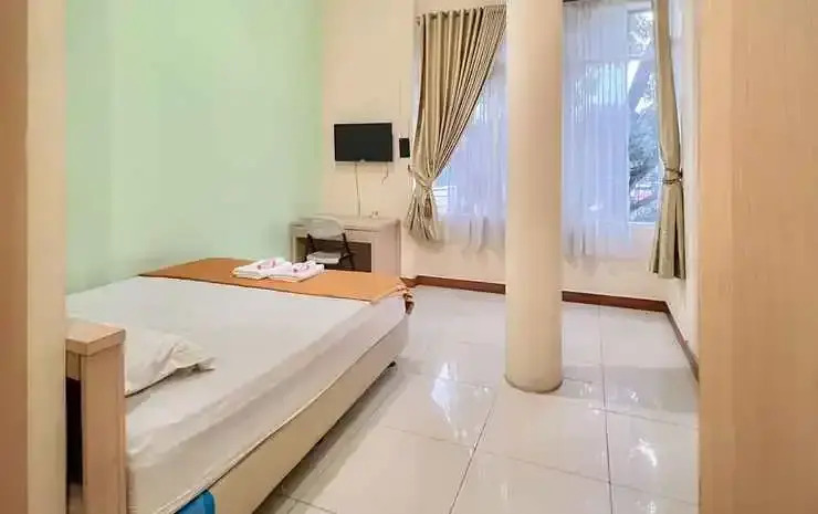 Wisma Anggrek Syariah Mitra Reddoorz