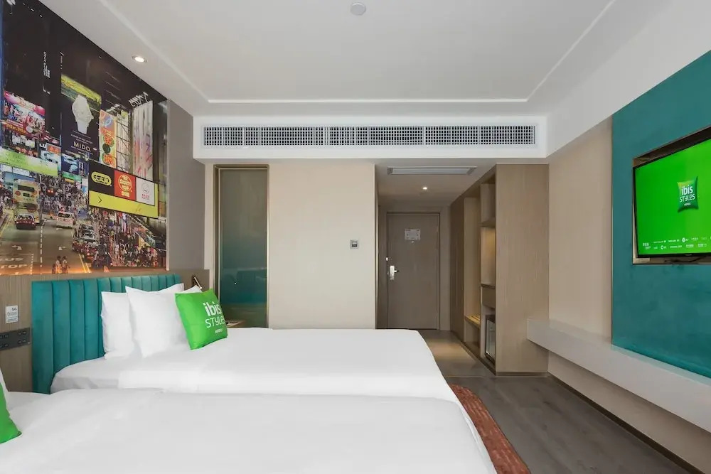 Kaigaosi Hotel (Guangzhou Railway Station Subway Station Baima Clothing City)