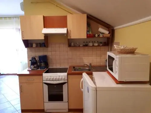 Rozmaring Apartmanok