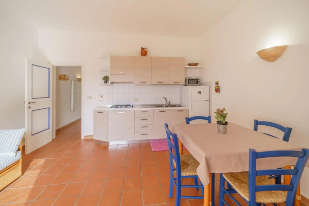 Baia Blu 2 in a small complex of colourful houses that directly overlooks the beach of Forno.-BAIA BLU N°2