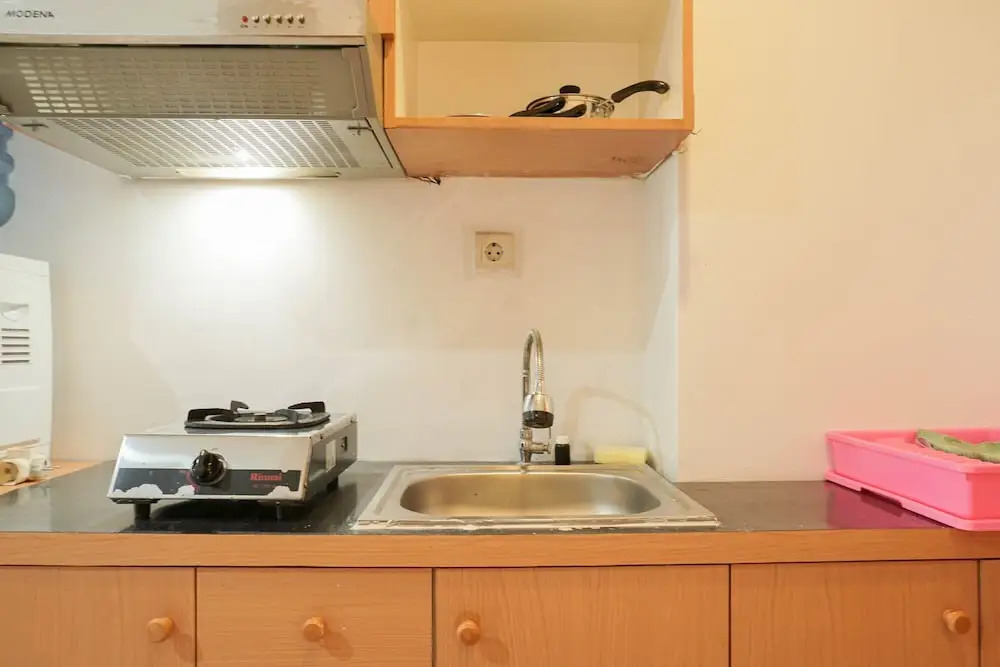 Cozy and Simply Studio Titanium Square Apartment