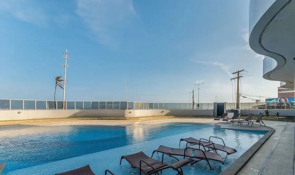 Your Exclusive Stay in a Building With a Pool Just Steps From the sea - WJA