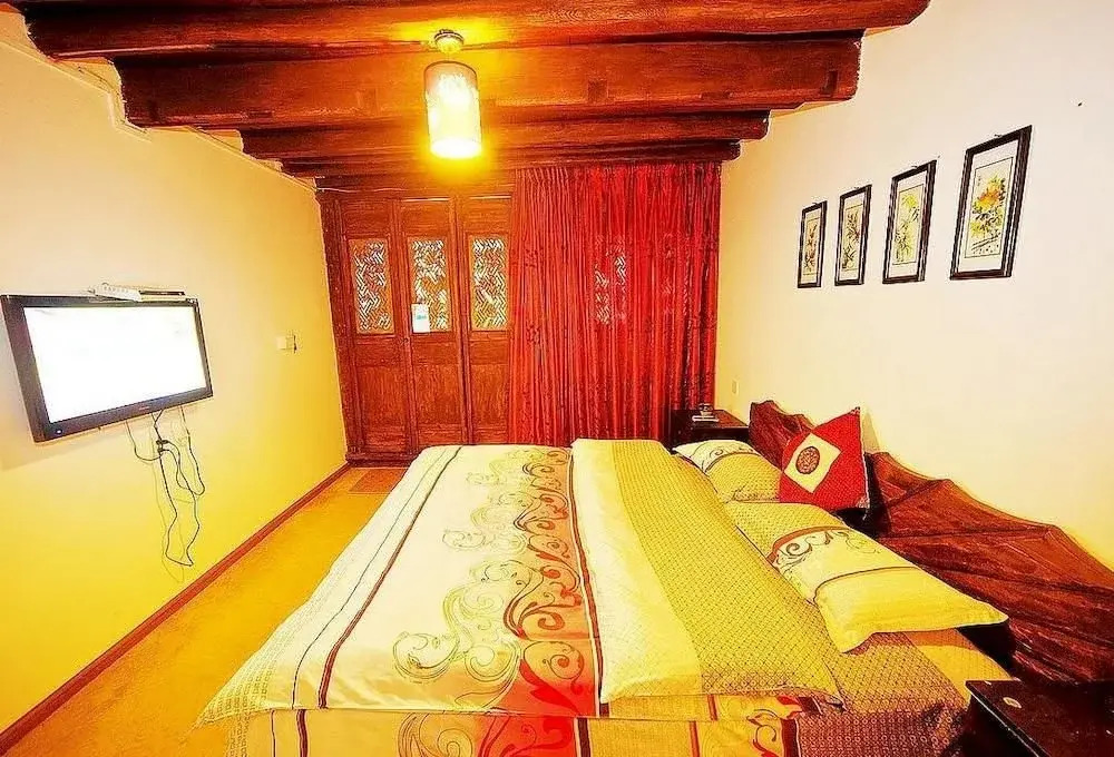 Lijiang Caicaijia Inn