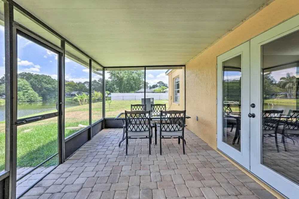 Lanai & Pond at Tranquil Bradenton Retreat!