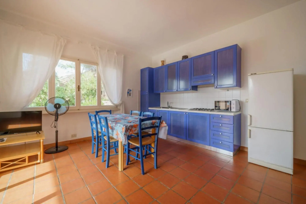 Baia Blu 1 in a small complex of colourful houses that directly overlooks the beach of Forno.-BAIA BLU N°1