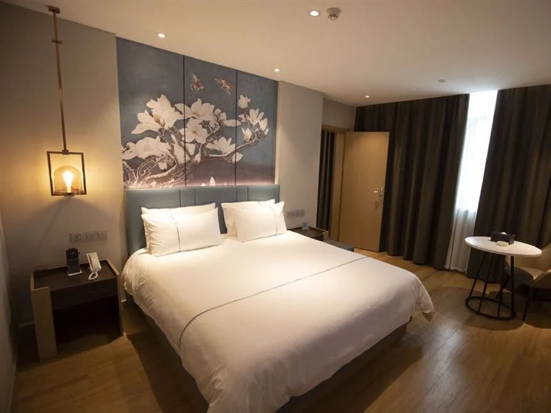 Magnotel Hotel (Dongxing Guomen Port)