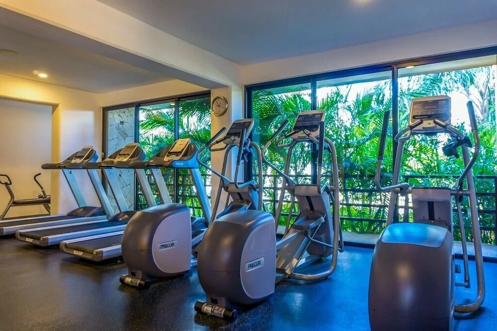 Lunada 314 Modern Playa del Carmen Condo with Tropical Garden View by RedAwning
