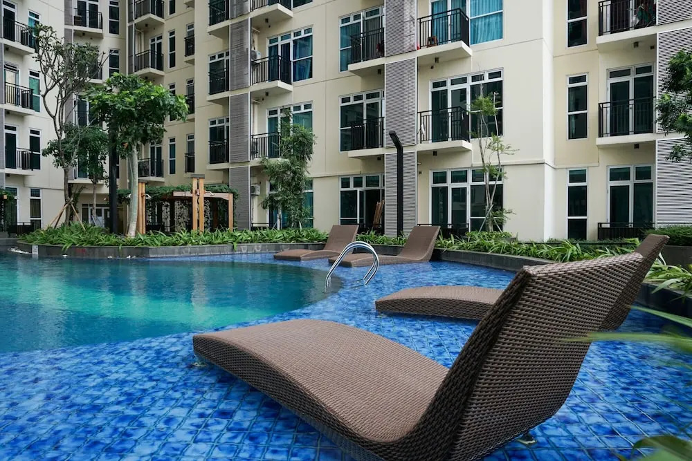 Furnished Studio with Pool View at Puri Orchard Apartment