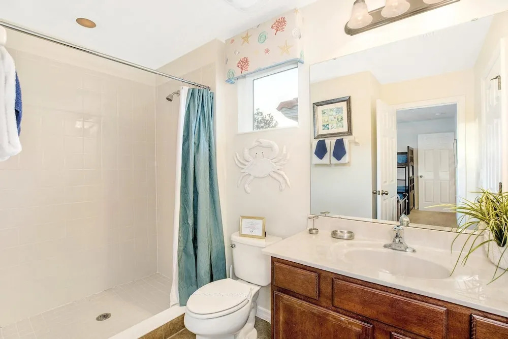 Spacious 6-Bedroom Getaway with Game Room, Private Spa & Sunny Pool Deck in Premier Resort Setting