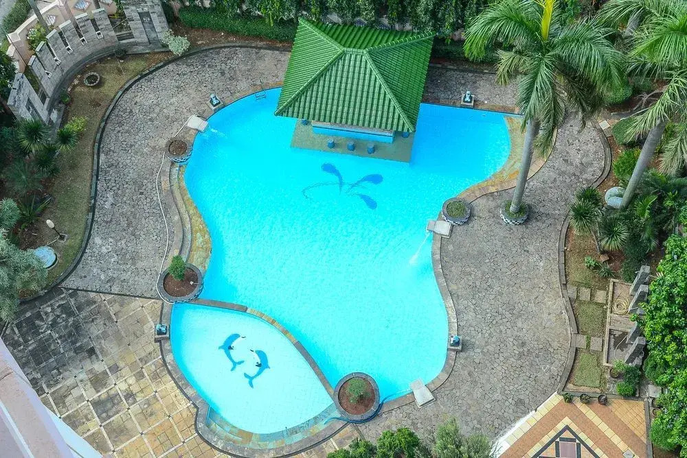 1 Bedroom at Puri Garden Apartment by Travelio