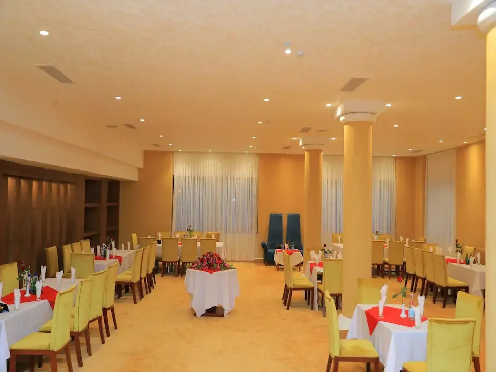 Kenenisa.. Oasis International Hotel