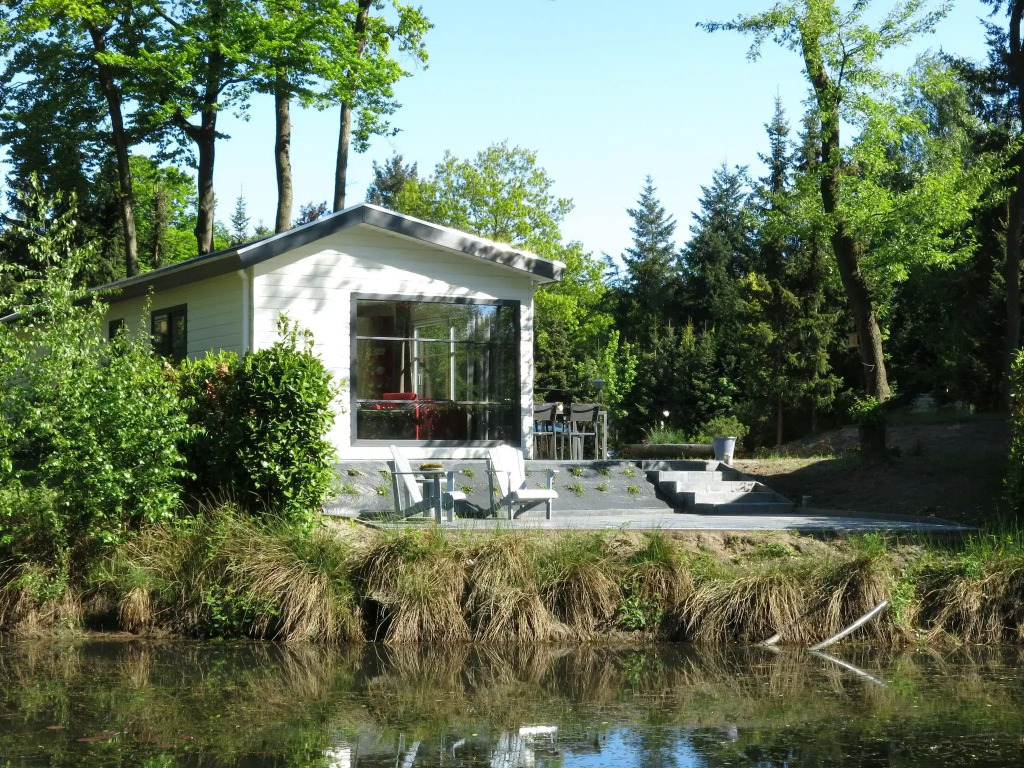 Modern chalet with two terraces and near a pond